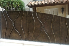 Hermes railings with hammered sheet backing